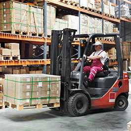 Worker Operating Forklift